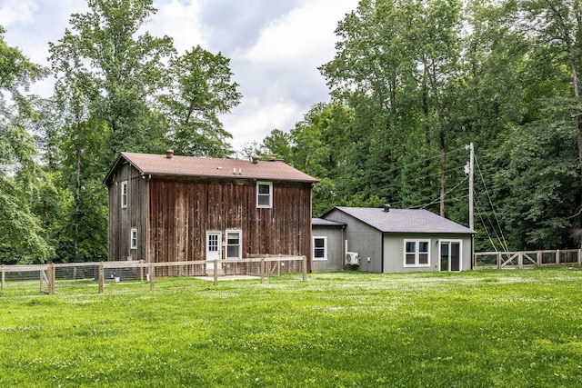 13989 Owens Chapel Rd, Springfield, TN 37172 - rear view of house with a fenced backyard
