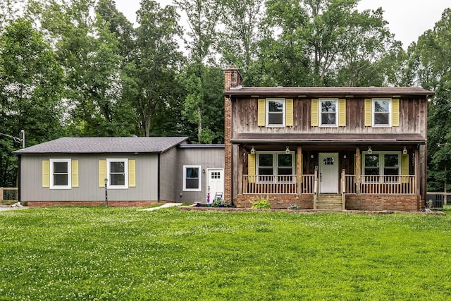 13989 Owens Chapel Rd, Springfield, TN 37172 - view of front of home with covered porch, a chimney, a front yard, and view of wooded area