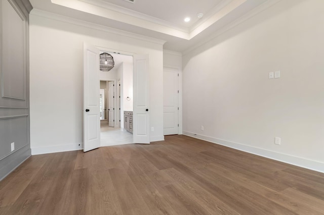 5743 Sagebrush Dr, Murfreesboro, TN 37129 - spare room featuring wood finished floors, crown molding, a tray ceiling, and recessed lighting
