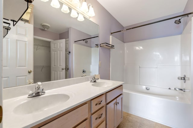 3406 Meadowhill Dr, Murfreesboro, TN 37130 - bathroom featuring washtub / shower combination, double vanity, tile patterned flooring, and a walk in closet