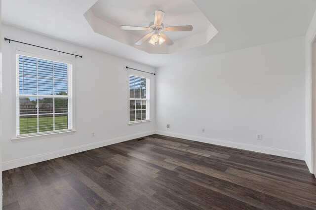 3406 Meadowhill Dr, Murfreesboro, TN 37130 - unfurnished room with a raised ceiling, dark wood finished floors, and ceiling fan