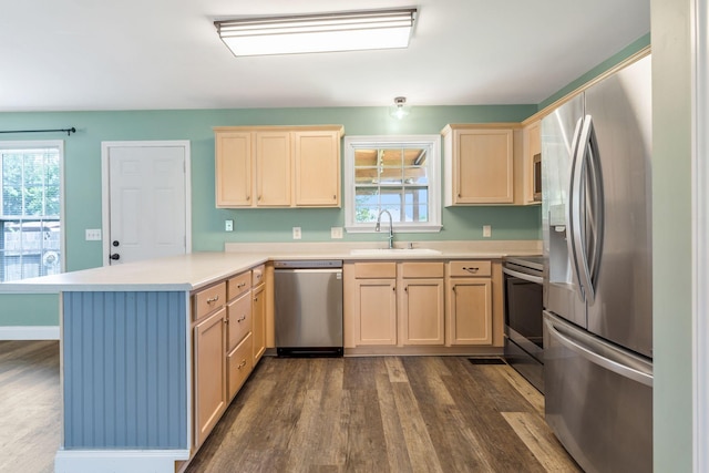 3406 Meadowhill Dr, Murfreesboro, TN 37130 - kitchen featuring stainless steel appliances, a peninsula, light brown cabinets, and light countertops