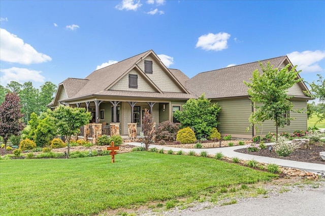 180 Jasper Springs Dr, Jasper, TN 37347 - craftsman house featuring covered porch and a front lawn