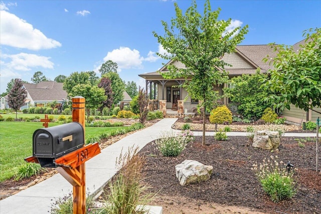 180 Jasper Springs Dr, Jasper, TN 37347 - view of front of home with a porch and a front lawn