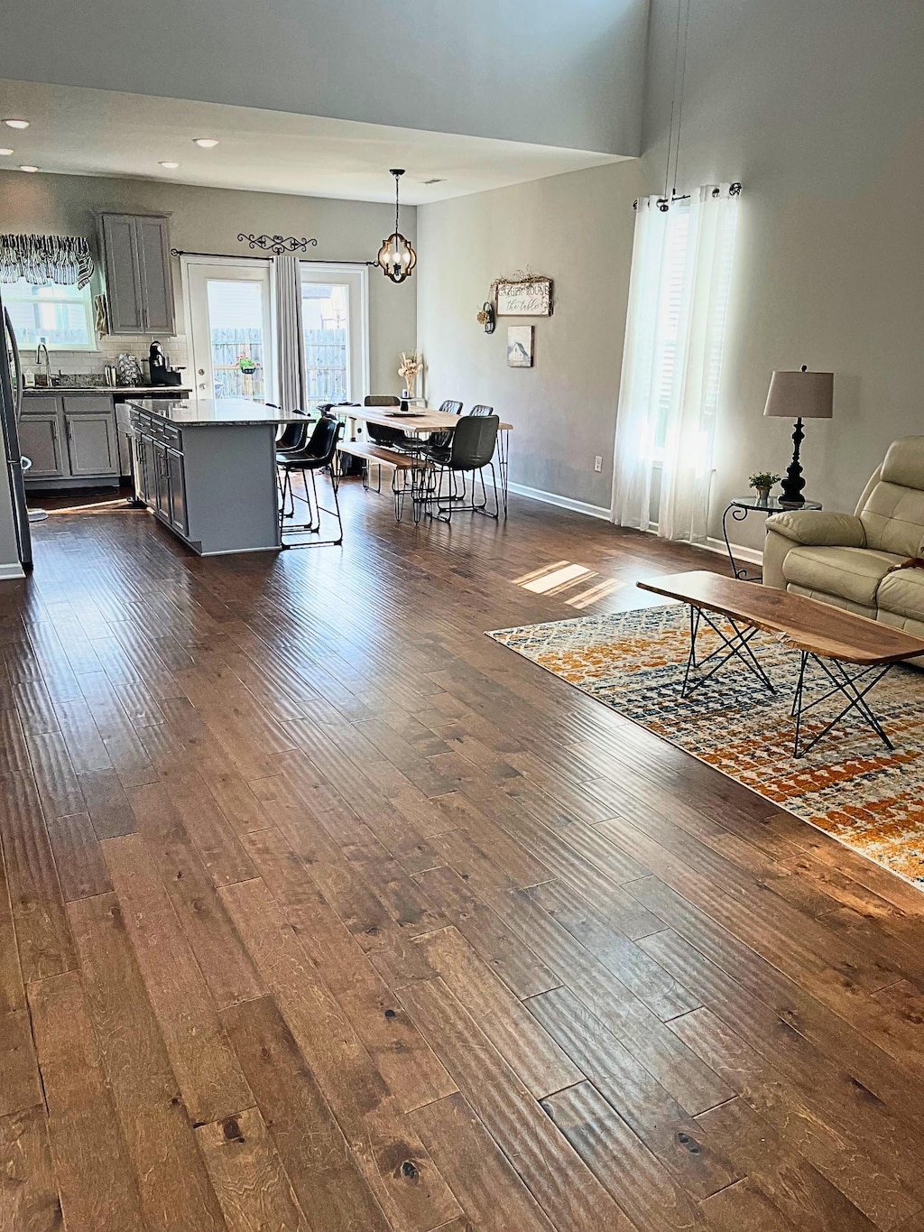 629 Whirlaway Dr, Burns, TN 37029 - living room featuring dark wood-style floors, recessed lighting, and a chandelier