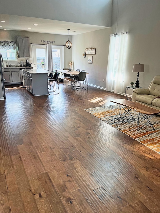 629 Whirlaway Dr, Burns, TN 37029 - living room featuring dark wood-style floors, recessed lighting, and a chandelier