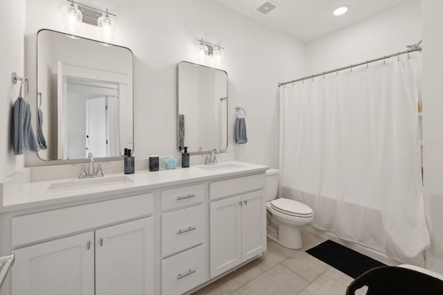 234 Sounder Cir, La Vergne, TN 37086 - full bath with double vanity, shower / bath combination with curtain, tile patterned floors, and recessed lighting