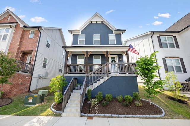 234 Sounder Cir, La Vergne, TN 37086 - view of front of house featuring a porch, stairs, and board and batten siding