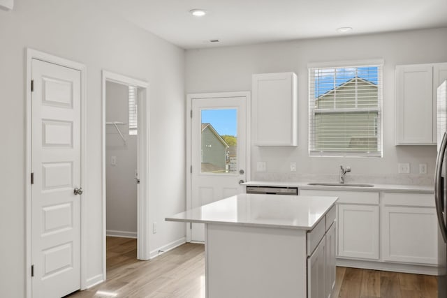 2509 Drumwright Way, Columbia, TN 38401 - kitchen featuring a kitchen island, light wood-style flooring, light countertops, white cabinets, and recessed lighting