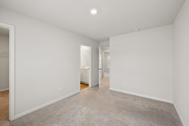 2509 Drumwright Way, Columbia, TN 38401 - unfurnished bedroom with light carpet, a spacious closet, a closet, and recessed lighting