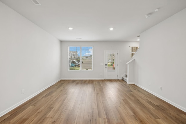 2509 Drumwright Way, Columbia, TN 38401 - unfurnished living room featuring light wood-style floors, stairway, and recessed lighting