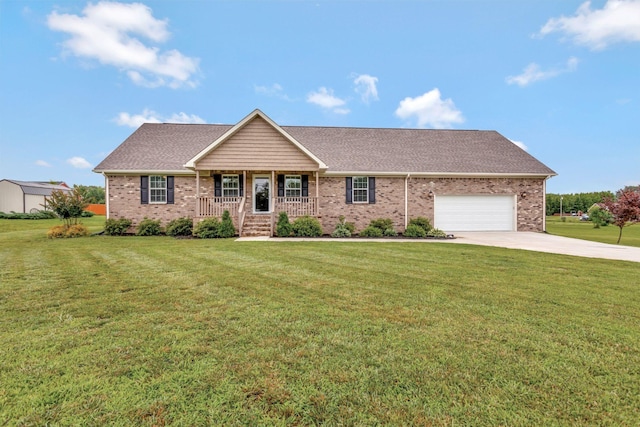 288 Springwater Dr, Summertown, TN 38483 - single story home with driveway, a porch, a garage, a front yard, and brick siding