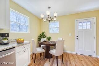 1112 Brookside Ave, Maryville, TN 37804 - dining space featuring healthy amount of natural light, a chandelier, and light wood finished floors