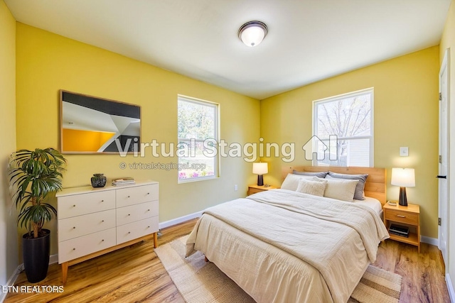 1112 Brookside Ave, Maryville, TN 37804 - bedroom with multiple windows and light wood-style flooring