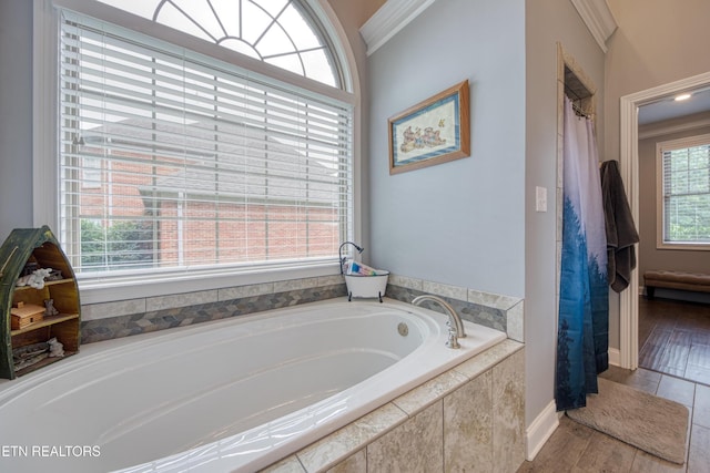 2023 Legacy Ln, Maryville, TN 37803 - full bathroom with a garden tub, wood finished floors, and crown molding