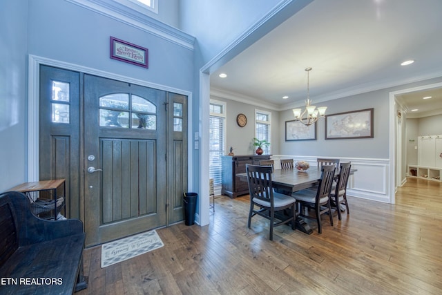 2023 Legacy Ln, Maryville, TN 37803 - foyer entrance featuring a chandelier, wood finished floors, a wainscoted wall, recessed lighting, and ornamental molding