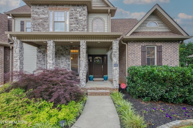 2023 Legacy Ln, Maryville, TN 37803 - view of front of home featuring a shingled roof and stone siding