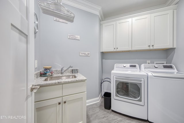 2023 Legacy Ln, Maryville, TN 37803 - washroom with cabinet space, separate washer and dryer, and crown molding