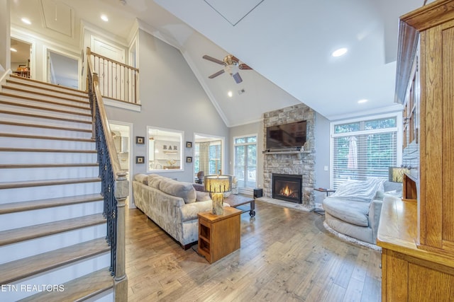 2023 Legacy Ln, Maryville, TN 37803 - living area with high vaulted ceiling, healthy amount of natural light, a fireplace, stairway, and ceiling fan