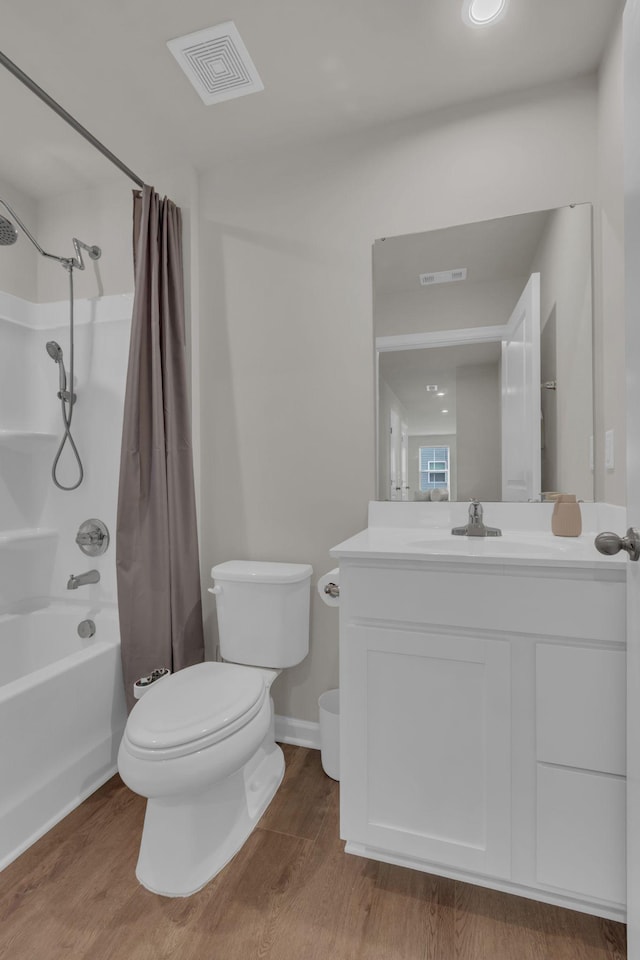 1830 Quail Run Way, Spring Hill, TN 37174 - bathroom with wood finished floors, vanity, and shower / tub combo