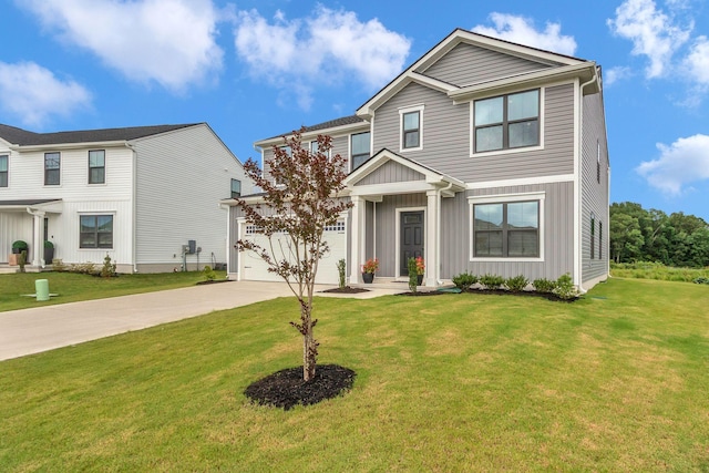 1830 Quail Run Way, Spring Hill, TN 37174 - view of front of property with concrete driveway, board and batten siding, a front lawn, and a garage