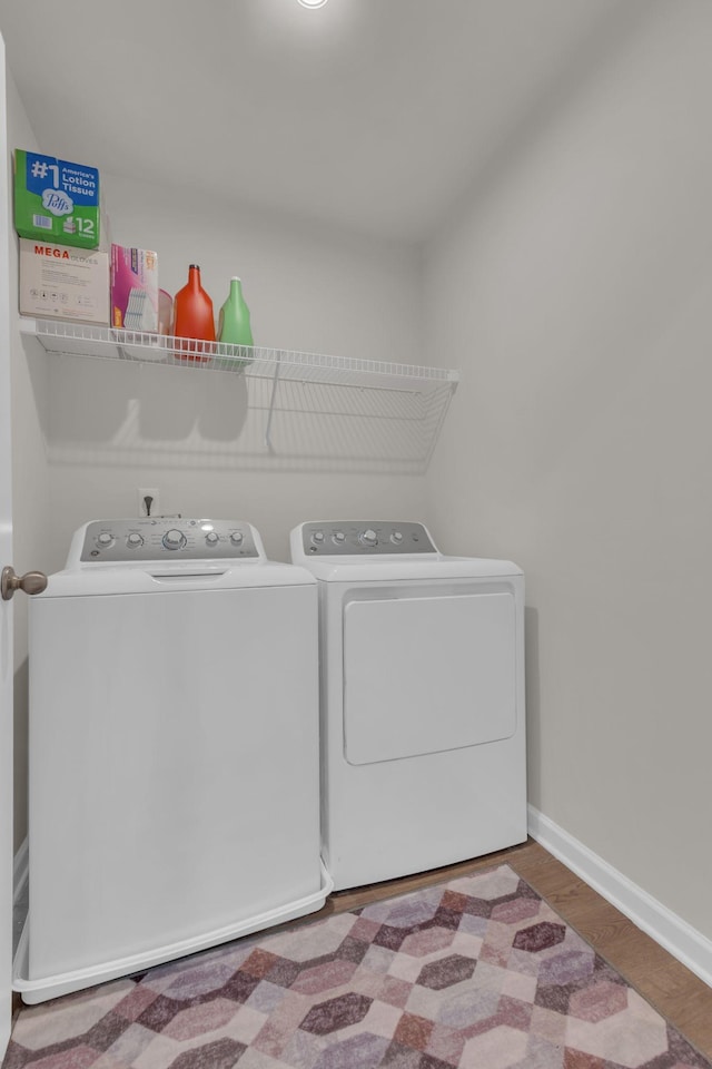 1830 Quail Run Way, Spring Hill, TN 37174 - laundry area featuring washer and dryer and wood finished floors