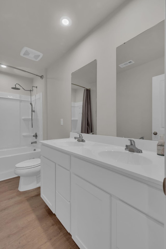 1830 Quail Run Way, Spring Hill, TN 37174 - full bathroom featuring double vanity, shower / washtub combination, and wood finished floors
