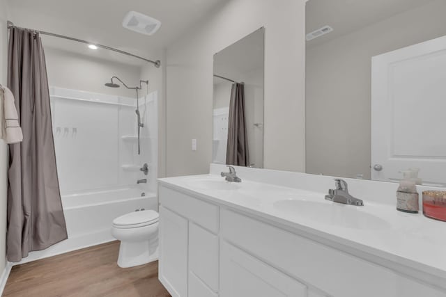 1830 Quail Run Way, Spring Hill, TN 37174 - bathroom featuring shower / bath combination with curtain, wood finished floors, and double vanity