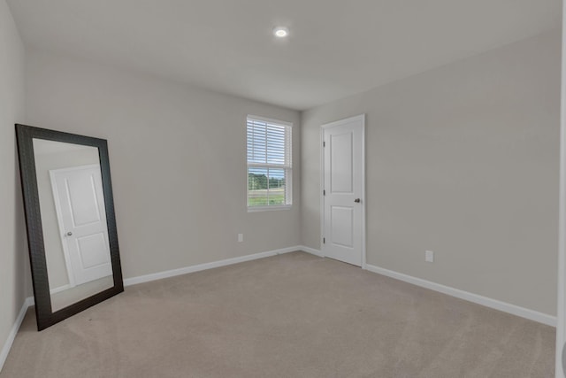 1830 Quail Run Way, Spring Hill, TN 37174 - empty room with light colored carpet and recessed lighting