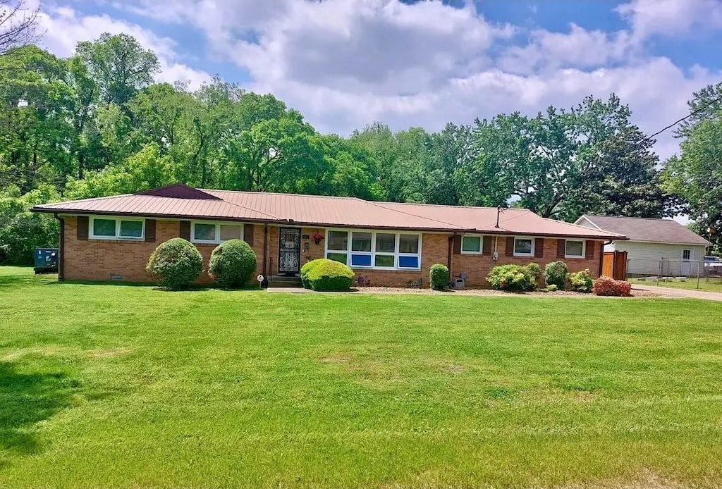 100 Mapleview St, Smyrna, TN 37167 - single story home featuring brick siding, a metal roof, and crawl space