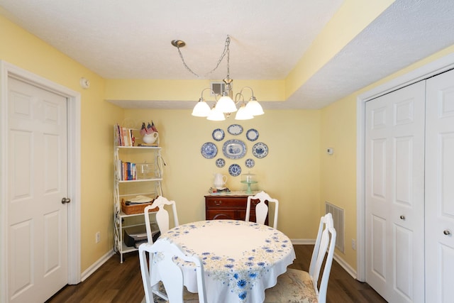 306 Norvich Ct, Franklin, TN 37069 - dining room with dark wood-type flooring and a chandelier