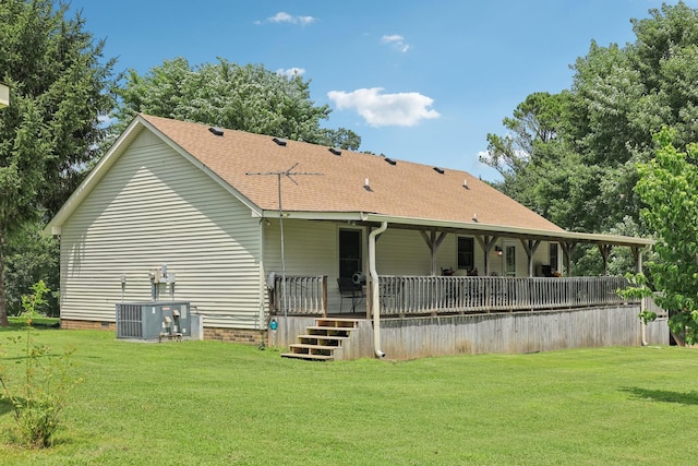 10615 Owens Chapel Rd, Springfield, TN 37172 - rear view of property with a lawn and roof with shingles