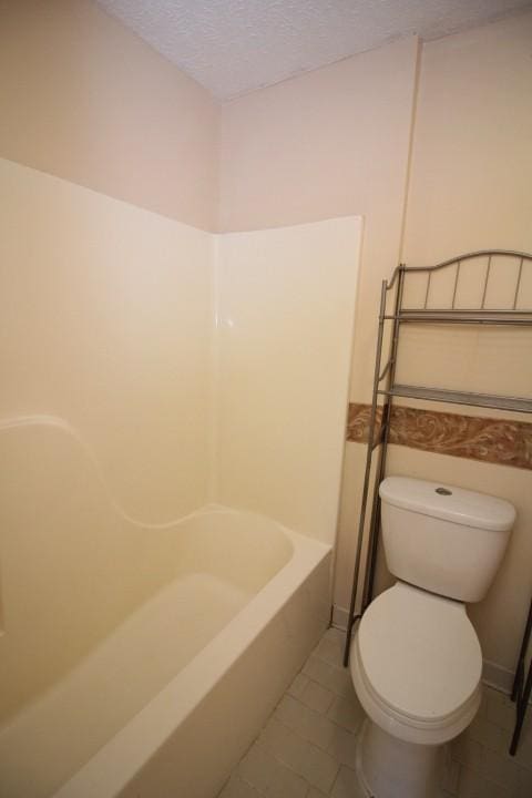 1211 Patton Pl, Oak Grove, KY 42262 - bathroom with tile patterned flooring and a textured ceiling