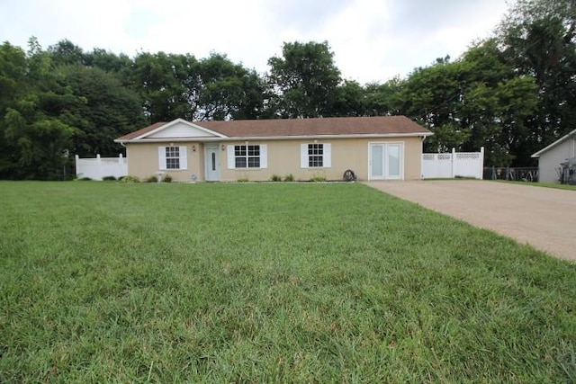 1211 Patton Pl, Oak Grove, KY 42262 - ranch-style house featuring stucco siding and concrete driveway