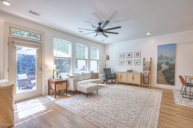 3105 Defilade Dr, Murfreesboro, TN 37128 - living room featuring healthy amount of natural light, a ceiling fan, light wood-style flooring, and recessed lighting