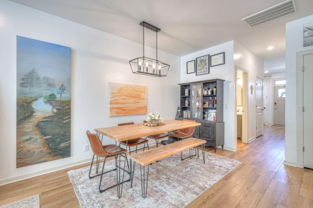 3105 Defilade Dr, Murfreesboro, TN 37128 - dining area featuring light wood-type flooring, a chandelier, and recessed lighting