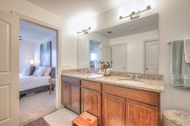 3105 Defilade Dr, Murfreesboro, TN 37128 - full bath featuring double vanity, ensuite bath, and wood finished floors