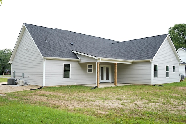 825B College St, Portland, TN 37148 - rear view of house with french doors, a patio area, a shingled roof, and a yard