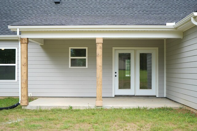 825B College St, Portland, TN 37148 - property entrance with roof with shingles and a patio