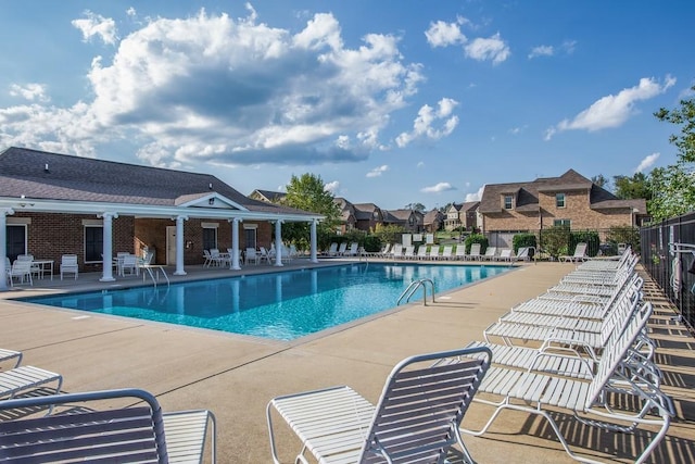 3001 Foust Dr, Spring Hill, TN 37174 - community pool featuring a patio area and a residential view
