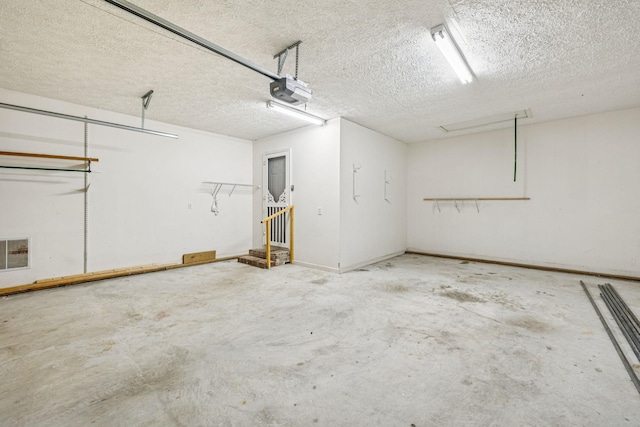 5531 Willow Oak Dr, Baxter, TN 38544 - garage featuring a garage door opener