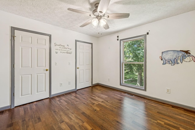 5531 Willow Oak Dr, Baxter, TN 38544 - unfurnished bedroom with wood finished floors, a textured ceiling, and a ceiling fan