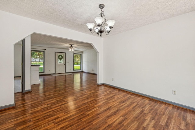 5531 Willow Oak Dr, Baxter, TN 38544 - spare room with wood finished floors, a textured ceiling, a chandelier, ceiling fan, and arched walkways