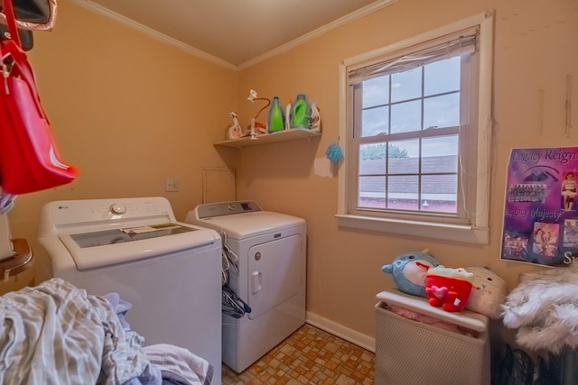 404 Mullican St, Mcminnville, TN 37110 - laundry area featuring separate washer and dryer, ornamental molding, and light flooring