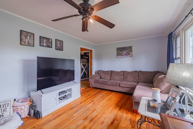 404 Mullican St, Mcminnville, TN 37110 - living area featuring crown molding, wood finished floors, and a ceiling fan