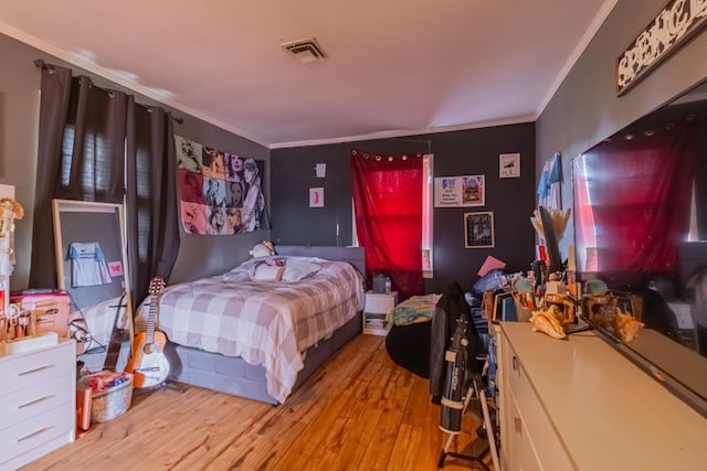 404 Mullican St, Mcminnville, TN 37110 - bedroom with crown molding and light wood-style floors