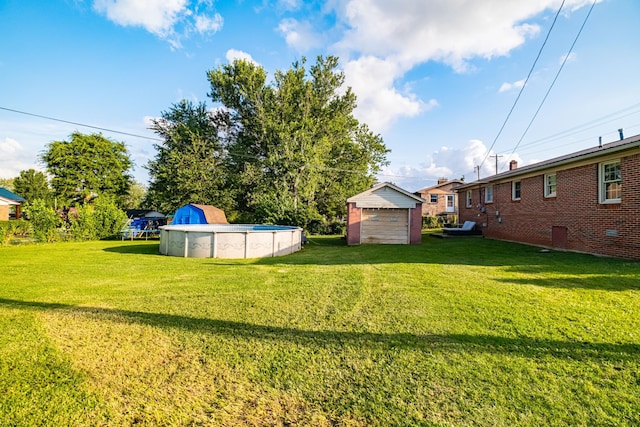 404 Mullican St, Mcminnville, TN 37110 - view of green lawn featuring an outdoor pool and a shed