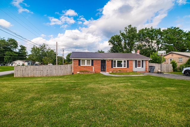 404 Mullican St, Mcminnville, TN 37110 - ranch-style home with brick siding, a chimney, a metal roof, and asphalt driveway