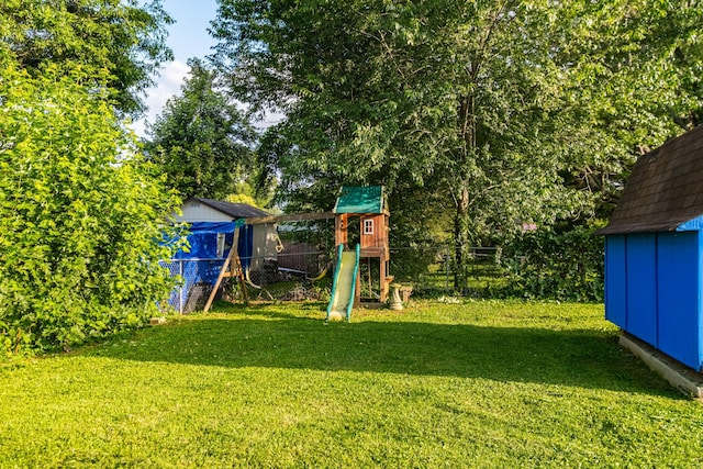 404 Mullican St, Mcminnville, TN 37110 - view of yard with a playground and a shed