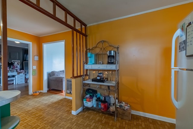 404 Mullican St, Mcminnville, TN 37110 - kitchen featuring ornamental molding and fridge